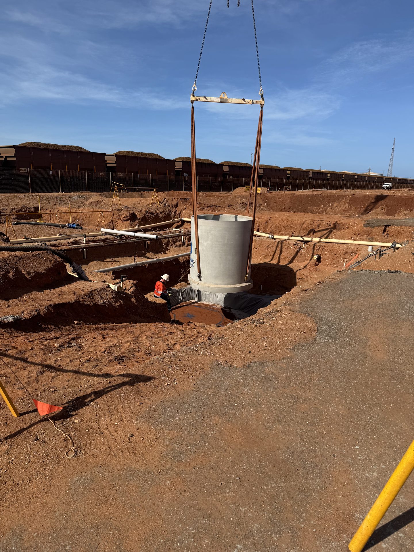 JBS crew craning a pump station chamber into place on a Pilbara mine site